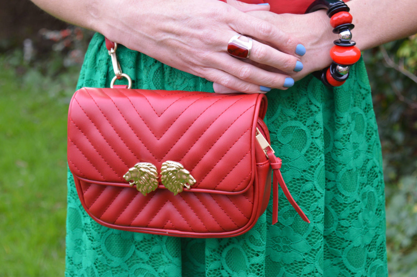 Green lace dress, Zara red multiway bag