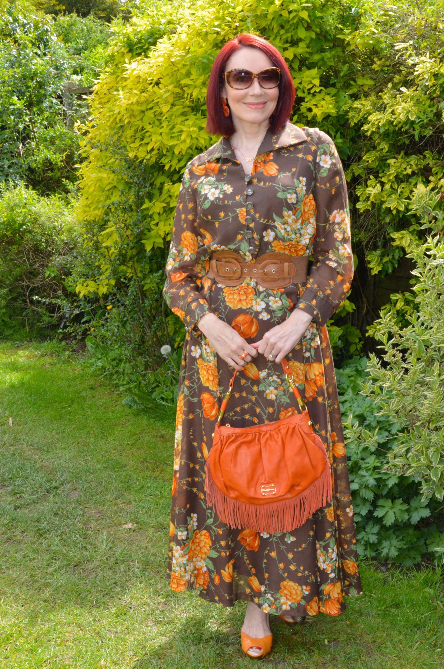 Wearing Pre-loved Floral Prints - May's Thrifty Six, vintage brown and orange floral print maxi dress, Modalu orange fringed bag
