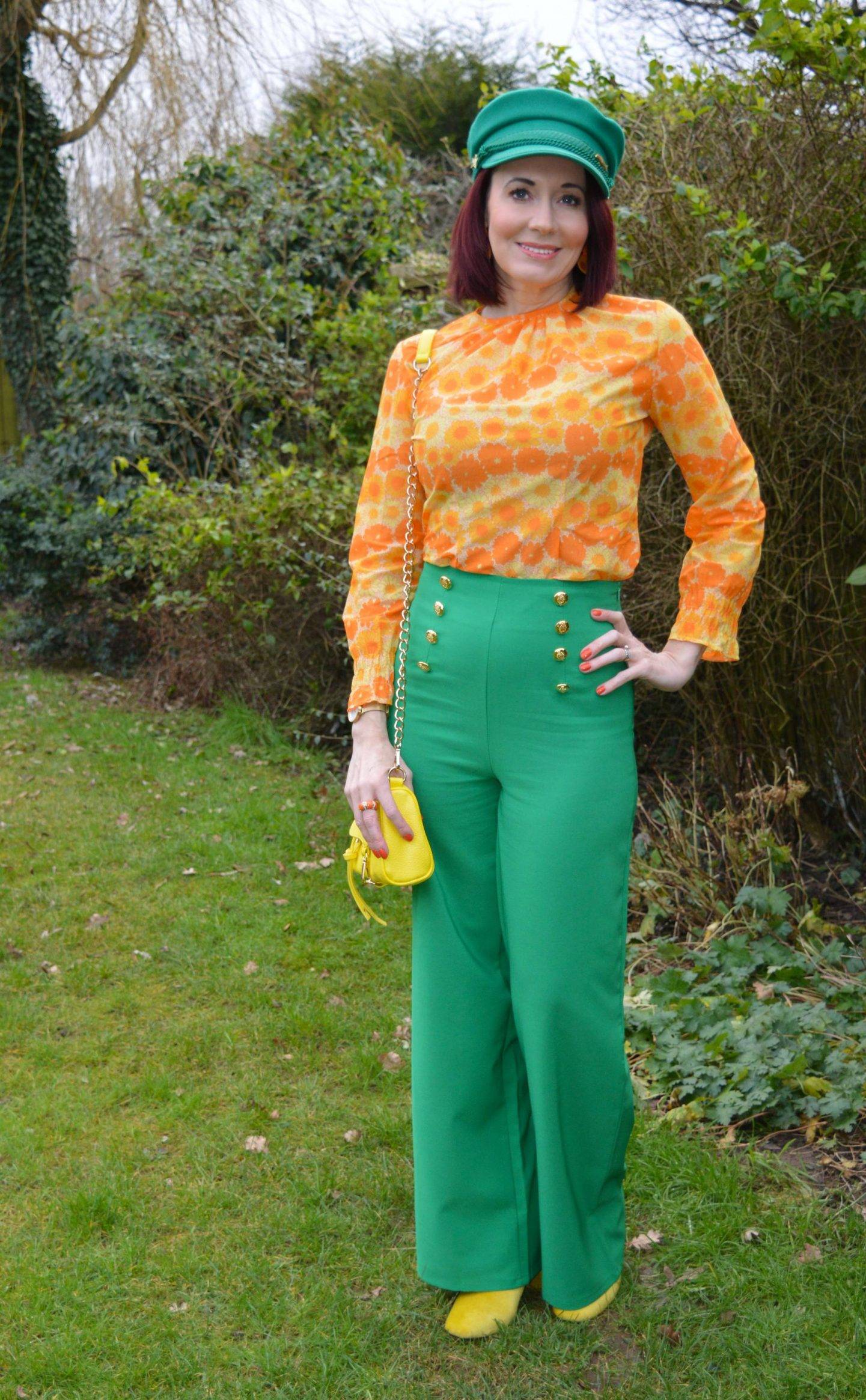 Favourite Outfits of 2021, vintage orange floral print top. Flounce London green trousers, Fabienne Chapot green cap