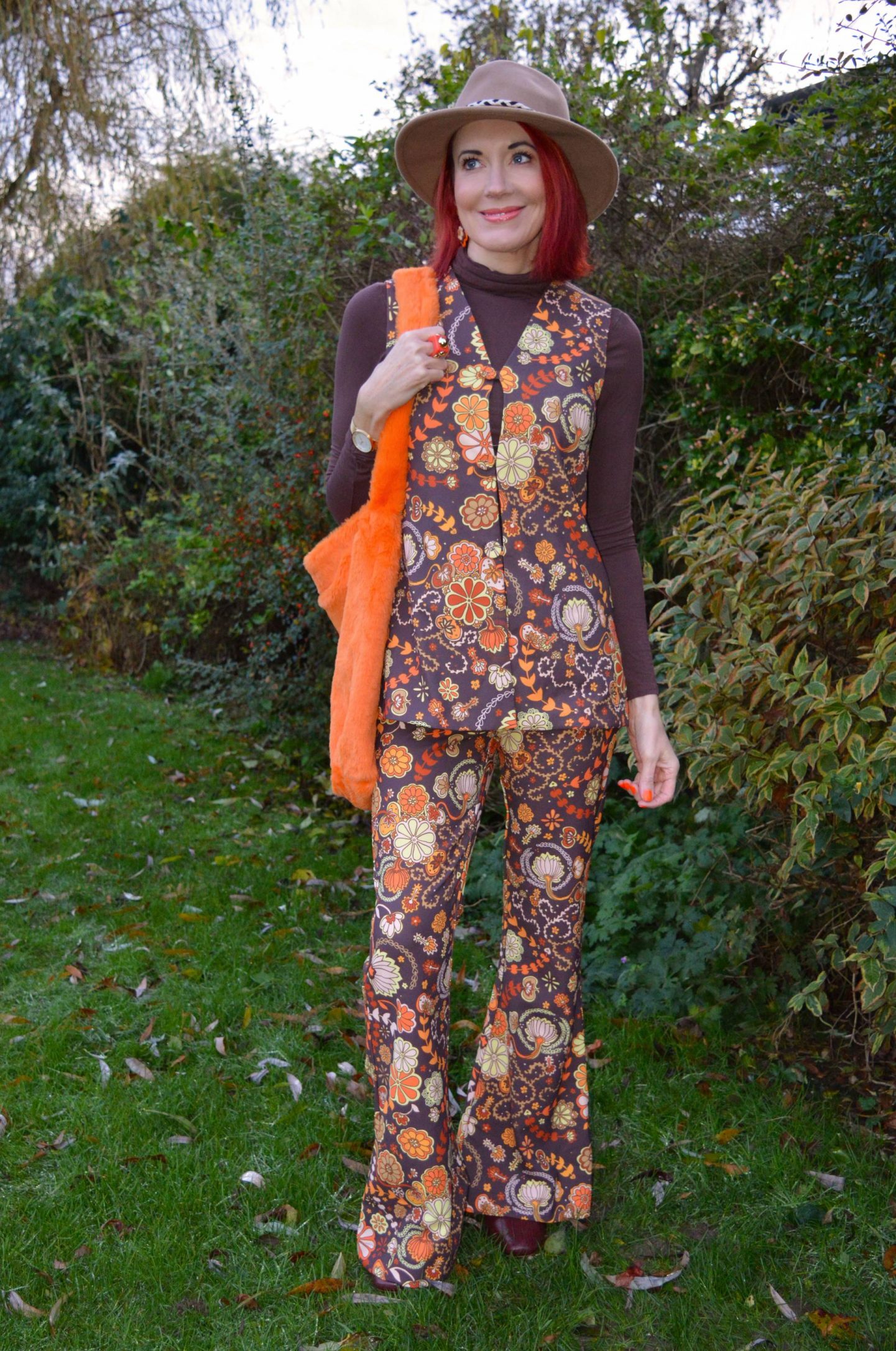 Hippie Shake Retro Print Waistcoat Suit and Fenella Smith London Orange Faux Fur Bag
