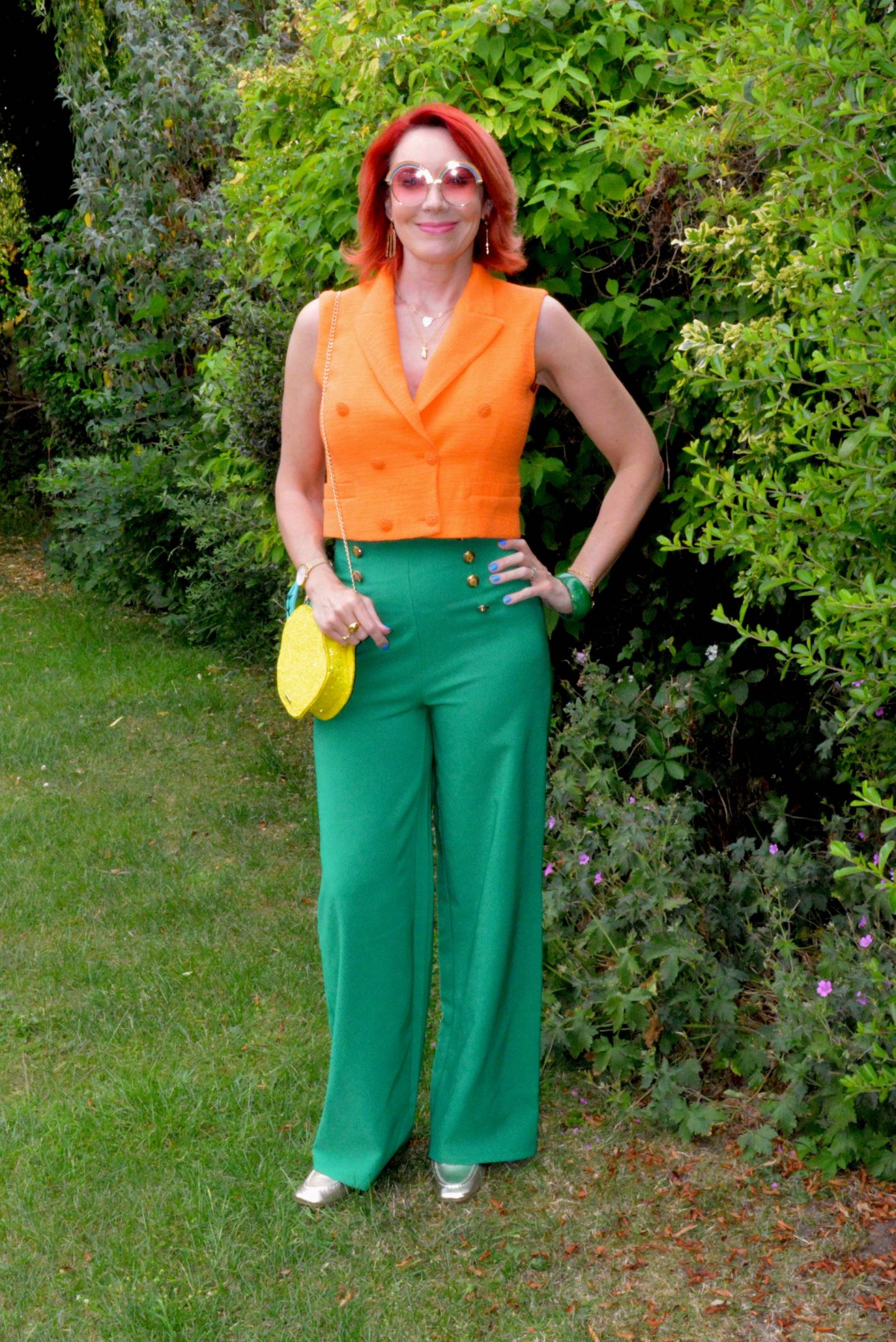 Wear The Colours of Your Soul - June's Thrifty Six, Zara orange waistcoat, green Flounce London trousers, SkinnyDip London lemon glitter bag, SkinnyDip London round rainbow glasses
